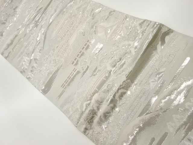 プラチナ箔九百錦寺院に遠山・風景模様織出し袋帯